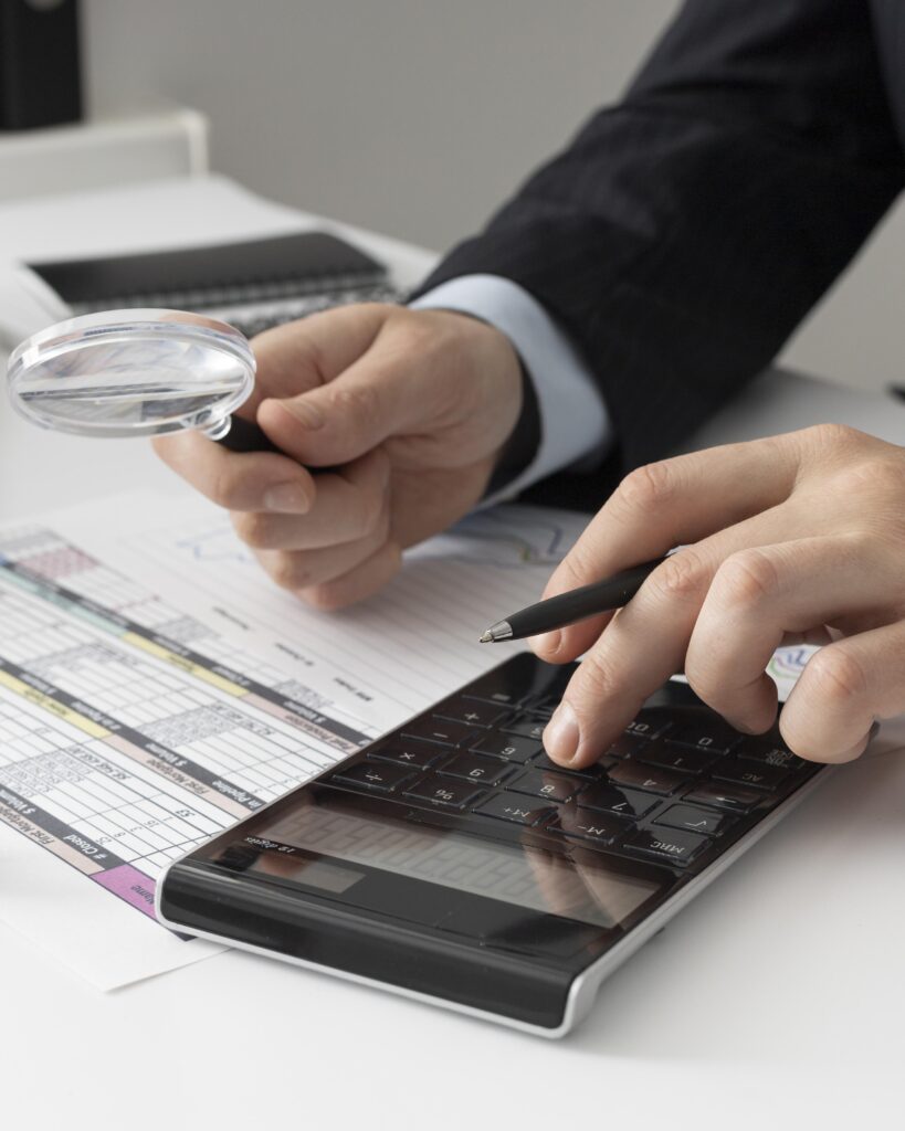 business-man-calculating-finance-numbers
